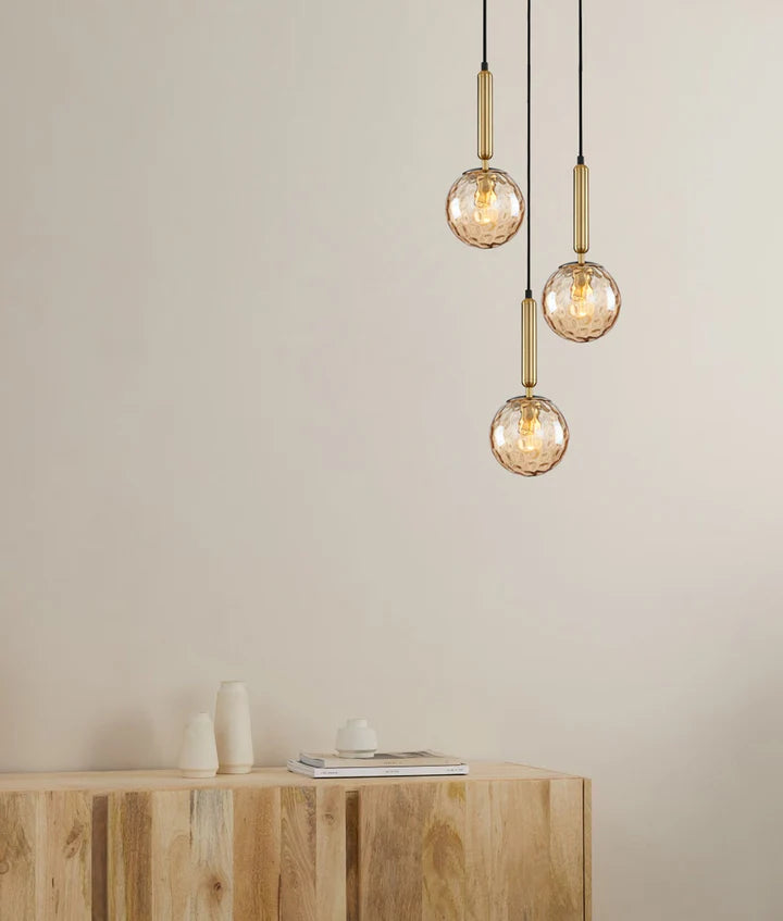 TRATTINO: Interior Bronze Amber / Smokey Black Spherical Glass Multiple Round Base Pendant Lights